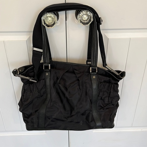 Like new Burberry baby bag.  Great as a regular tote with crossbody strap. - Picture 1 of 1